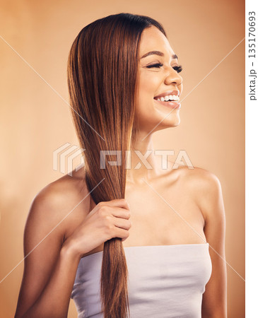 Happy woman, hair and beauty with salon hairstyle, haircare and keratin treatment isolated on studio background. Female model smile, color highlights and cosmetic care, texture and growth with shine Happy woman, hair and beauty with salon hairstyle, haircare and keratin treatment isolated on studio background. Female model smile, color highlights and cosmetic care, texture and growth with shine 135170693