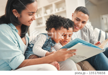 Young happy family, children reading and sofa for story, book and learning together in home, love and bonding. Parents, education and kids on living room couch with smile, care and support in house Young happy family, children reading and sofa for story, book and learning together in home, love and bonding. Parents, education and kids on living room couch with smile, care and support in house 135170838