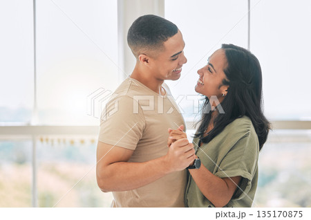 Happy, couple and dance in home for love, care and support of relationship, trust and quality time together. Man, woman and dancing with partner in fun, happiness or celebrate of romantic anniversary Happy, couple and dance in home for love, care and support of relationship, trust and quality time together. Man, woman and dancing with partner in fun, happiness or celebrate of romantic anniversary 135170875