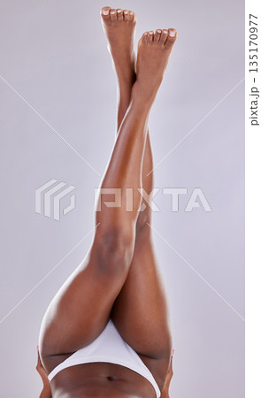 Skincare, grooming and legs of woman on studio floor for shaving, wellness and hair removal. Beauty, underwear and female person on white background for epilation cosmetics, natural skin or body care 135170977