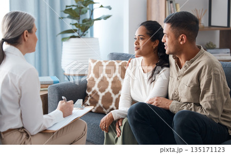 Couple on sofa, therapist and counselling for support, love and help with relationship advice together. Man, woman and psychologist in conversation, healthy communication and healing marriage therapy 135171123