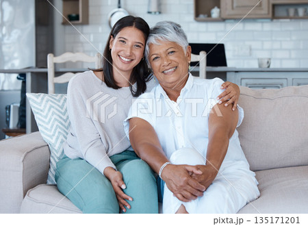 Sofa, mothers day and portrait of women happy for care, trust and support couch in a home together and smile. Happiness, love and elderly mother and daughter relax in a living room or lounge Sofa, mothers day and portrait of women happy for care, trust and support couch in a home together and smile. Happiness, love and elderly mother and daughter relax in a living room or lounge 135171201