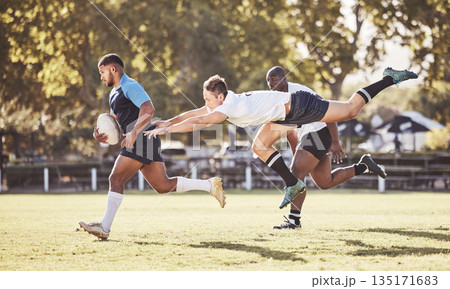 Sports, rugby and men in action on field for match, practice and game in tournament or competition. Fitness, teamwork and strong players tackle for exercise, training and performance to win ball Sports, rugby and men in action on field for match, practice and game in tournament or competition. Fitness, teamwork and strong players tackle for exercise, training and performance to win ball 135171683