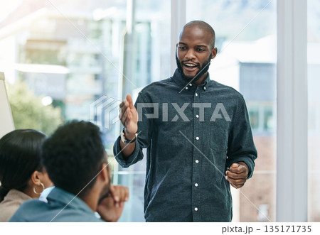 Presentation, planning and training with black man in business meeting for motivation, mentor and leadership. Teamwork, conference and speaker with employee in workshop for mission, project and idea 135171735