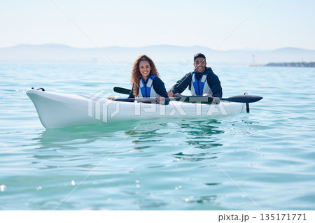 Couple, kayak and rowing boat on lake, ocean or river for water sports and fitness challenge. Portrait of man and woman with smile for adventure, exercise or travel in nature for freedom and teamwork 135171771