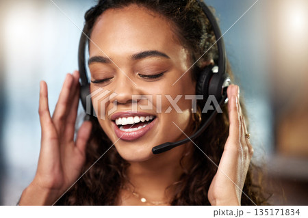Call center communication, headset or happy woman listening at telecom customer services office. Microphone, face or friendly sales agent consulting, speaking or talking in tech support help desk Call center communication, headset or happy woman listening at telecom customer services office. Microphone, face or friendly sales agent consulting, speaking or talking in tech support help desk 135171834