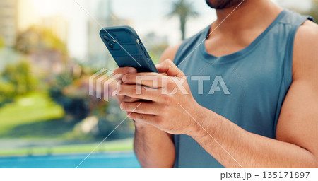 Hands, athlete and man with phone on tennis court with fitness app, training tips and track progress. Person, mobile and reservation for padel, technique and video demonstration for sports tournament 135171897
