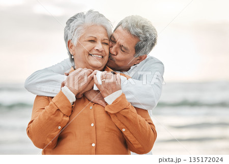 Happy senior couple, hug and beach with smile, bonding and kiss on cheek for romance, love and vacation. Elderly man, woman and embrace with happiness, retirement and travel by ocean for holiday Happy senior couple, hug and beach with smile, bonding and kiss on cheek for romance, love and vacation. Elderly man, woman and embrace with happiness, retirement and travel by ocean for holiday 135172024