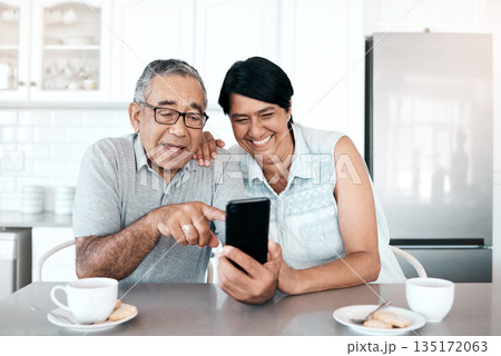 Happy, home and senior couple with a smartphone, connection and network with social media, mobile app or communication. Spouse, mature man or elderly woman with a cellphone, happiness or website info Happy, home and senior couple with a smartphone, connection and network with social media, mobile app or communication. Spouse, mature man or elderly woman with a cellphone, happiness or website info 135172063
