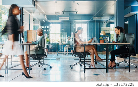 Busy, coworking and business people in the office for work with company diversity at an agency. Blur, corporate and employees in the workplace for professional commitment in an executive career 135172229