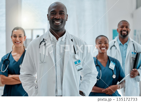 Happy, doctor and portrait of black man with team for medical help, insurance and trust in clinic. Healthcare, hospital and professional male and women health worker for service, consulting and care Happy, doctor and portrait of black man with team for medical help, insurance and trust in clinic. Healthcare, hospital and professional male and women health worker for service, consulting and care 135172733