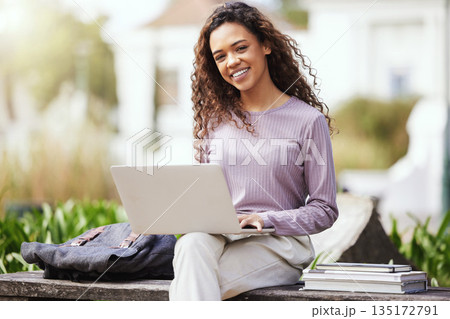 Woman, books and laptop with university student on campus, learning with scholarship at college and outdoor. Female person smile in portrait, course material and pc for studying with education 135172791