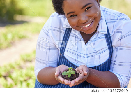 Agriculture, portrait and black woman with plant in hands for planting vegetables, harvest and ecosystem. Farming, sustainability and farmer with dirt in palms for environment, growth and nature 135172949