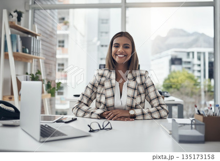 Portrait, office desk and happy woman for online copywriting, startup research and editing or career mindset. Face of young indian person, editor or employee working on laptop for creative planning Portrait, office desk and happy woman for online copywriting, startup research and editing or career mindset. Face of young indian person, editor or employee working on laptop for creative planning 135173158