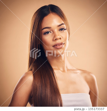 Woman, hair style and beauty in studio portrait with cosmetic wellness, glow and shine by brown background. Girl, latino model and haircare with makeup, health and cosmetics with growth by backdrop Woman, hair style and beauty in studio portrait with cosmetic wellness, glow and shine by brown background. Girl, latino model and haircare with makeup, health and cosmetics with growth by backdrop 135173337