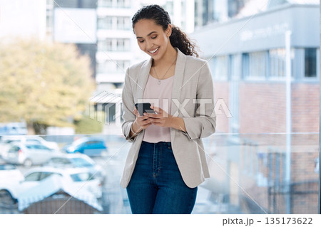 Phone, smile and business woman in office for networking, communication app and social media. Technology, internet and text message with female employee by window for professional, website and email Phone, smile and business woman in office for networking, communication app and social media. Technology, internet and text message with female employee by window for professional, website and email 135173622