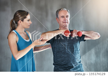 Physical therapy, dumbbell and coaching with old man and personal trainer for support, health and physiotherapy. Training, weightlifting and fitness with senior patient and physiotherapist for help 135174129