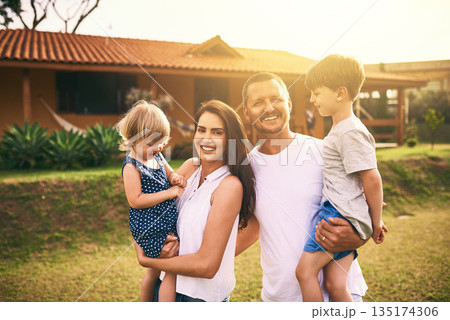 Family, bonding and garden with father, mother and kids with happiness and new home. Outdoor, mockup and lens flare of a mom, dad and children together on a lawn and backyard with a smile and care 135174306