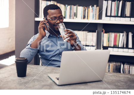 Drinking water, architect and black man with computer on a call with digital information in office. Company employee, architecture worker and African male person with mobile communication and smile Drinking water, architect and black man with computer on a call with digital information in office. Company employee, architecture worker and African male person with mobile communication and smile 135174674
