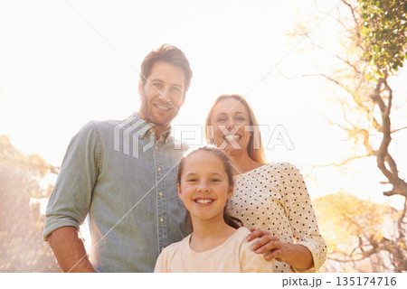 Nature, sunshine and happy portrait of family, parents and child support, bonding and enjoy outdoor quality time together. Sky, spring flare and happiness of mother, father or kid smile for love care Nature, sunshine and happy portrait of family, parents and child support, bonding and enjoy outdoor quality time together. Sky, spring flare and happiness of mother, father or kid smile for love care 135174716
