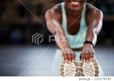 Gym, hands or happy girl stretching legs for workout routine or body movement for active fitness. Smile, closeup blur or healthy woman smiling in exercise training warm up for flexibility or mobility Gym, hands or happy girl stretching legs for workout routine or body movement for active fitness. Smile, closeup blur or healthy woman smiling in exercise training warm up for flexibility or mobility 135174795
