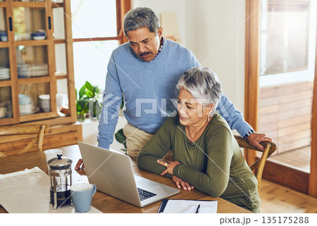 Finance, budget and senior couple on laptop with bills, paperwork and documents for life insurance. Retirement, pension and elderly man and woman on computer for mortgage payment, investment and tax Finance, budget and senior couple on laptop with bills, paperwork and documents for life insurance. Retirement, pension and elderly man and woman on computer for mortgage payment, investment and tax 135175288