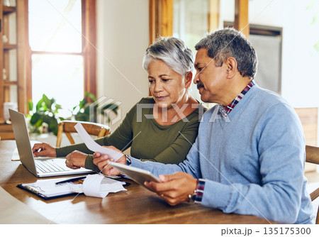 Senior couple, budget planning and health insurance checklist with computer at home. Documents, pension and elderly people with financial, tax and debt form in a house with bills and pc admin Senior couple, budget planning and health insurance checklist with computer at home. Documents, pension and elderly people with financial, tax and debt form in a house with bills and pc admin 135175300