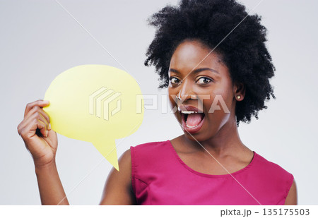Happy black woman, portrait and speech bubble in surprise for question or social media against a white studio background. African female person with afro or sign for comment or FAQ on mockup space 135175503