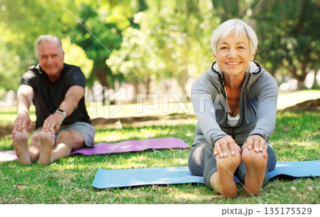 Portrait, fitness and senior couple in a park, yoga and meditation for wellness, workout and healthy lifestyle. Face, mature woman or old man outdoor, stretching and exercise for balance or fresh air 135175529