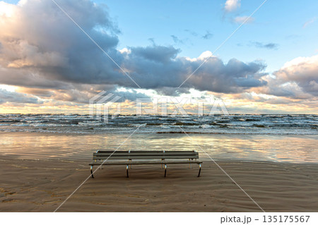 Scenic beach view in Jurmala, Latvia during a tranquil evening Scenic beach view in Jurmala, Latvia during a tranquil evening 135175567