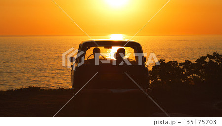 Beach, silhouette and people in car at sunset for freedom, travel or road trip together. Dark, summer and friends in transport in the evening at the ocean for a date, vacation or adventure by the sea Beach, silhouette and people in car at sunset for freedom, travel or road trip together. Dark, summer and friends in transport in the evening at the ocean for a date, vacation or adventure by the sea 135175703