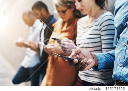 Social media, communication and phone with hands of people for networking, internet and connection. Technology, contact and search with friends at wall in city for website, online and app 135175726