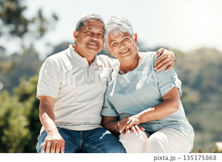Senior couple, portrait and hug in nature on vacation, holiday or summer bonding. Face, hugging and retirement of man and woman with happiness, love or enjoying quality time together on date outdoor. 135175868