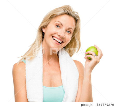Portrait, exercise and apple with a senior woman in studio isolated on a white background for health. Fitness, diet and lifestyle with a happy mature female athlete eating a fruit for nutrition 135175876