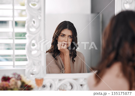 Beauty results, mirror reflection and woman check cosmetics application, natural skincare glow or luxury facial makeup. Wellness, thinking and relax person with self care routine in house bedroom Beauty results, mirror reflection and woman check cosmetics application, natural skincare glow or luxury facial makeup. Wellness, thinking and relax person with self care routine in house bedroom 135175877