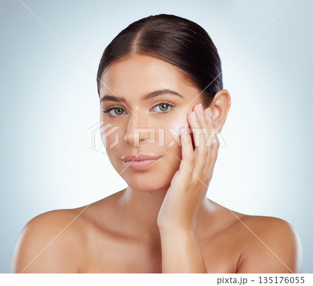 Skincare, face and beauty of woman with lotion in studio isolated on a white background. Portrait, dermatology cream and female model apply cosmetics, sunscreen or moisturizer product for skin health Skincare, face and beauty of woman with lotion in studio isolated on a white background. Portrait, dermatology cream and female model apply cosmetics, sunscreen or moisturizer product for skin health 135176055