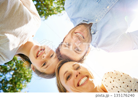 Happy portrait, outdoor circle and family child, mother and father support, bonding and enjoy outdoor quality time together. Love, sky and below view of mama, papa and kid smile for nature sunshine Happy portrait, outdoor circle and family child, mother and father support, bonding and enjoy outdoor quality time together. Love, sky and below view of mama, papa and kid smile for nature sunshine 135176240
