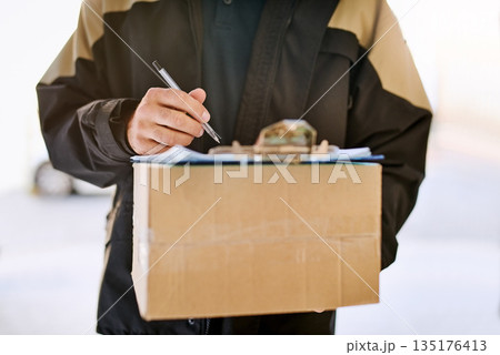 Delivery man, box and hands with a package and pen for signature on paper at front door. Logistics worker with a courier company parcel in cardboard for e commerce shipping or mail distribution Delivery man, box and hands with a package and pen for signature on paper at front door. Logistics worker with a courier company parcel in cardboard for e commerce shipping or mail distribution 135176413