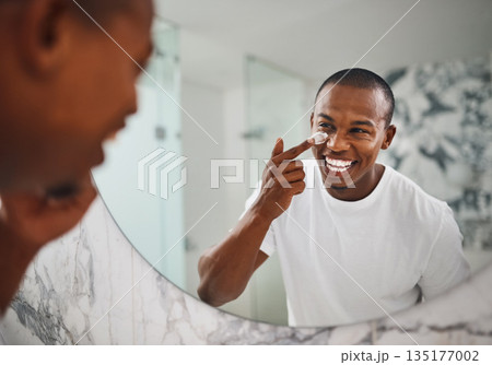Happy, skincare and mirror with black man in bathroom for beauty, morning and grooming. Cleaning, hygiene and self care with reflection of person and cream at home for facial, natural and wellness Happy, skincare and mirror with black man in bathroom for beauty, morning and grooming. Cleaning, hygiene and self care with reflection of person and cream at home for facial, natural and wellness 135177002