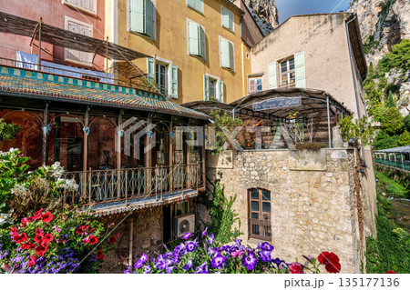 The narrow streets of the old village Moustiers Sainte Marie in 135177136