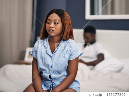 Divorce, black couple and woman on a bed, depression and relationship problems with stress, fighting and ignore. Partners, man and female person with anxiety, bedroom and home with marriage issues Divorce, black couple and woman on a bed, depression and relationship problems with stress, fighting and ignore. Partners, man and female person with anxiety, bedroom and home with marriage issues 135177292