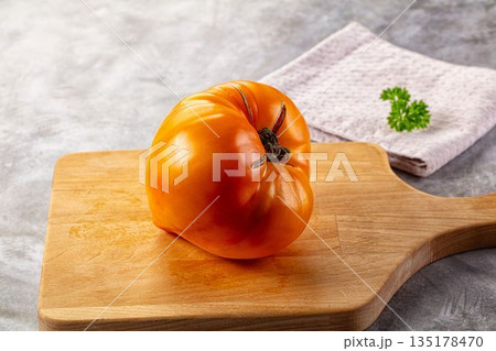 Yellow ripe juicy heart tomato Yellow ripe juicy heart tomato 135178470