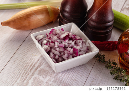 Diced red onion in the bowl 135178561