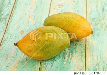 Sweet juicy ripe mango fruit Sweet juicy ripe mango fruit 135178702