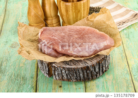 Raw turkey breast fillet piece Raw turkey breast fillet piece 135178709