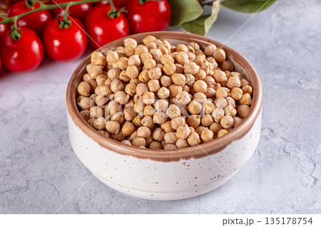 Raw dry chickpeas in the bowl Raw dry chickpeas in the bowl 135178754