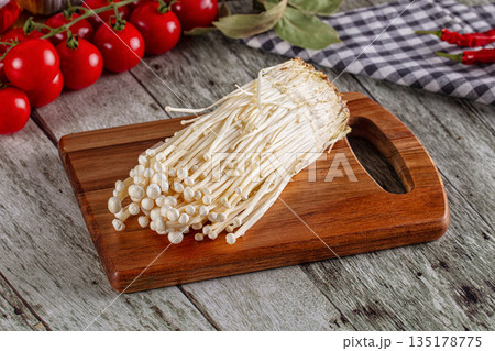 Raw organic fresh enoki mushrooms 135178775