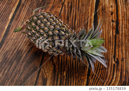 Fresh sweet juicy whole pineapple 135178839