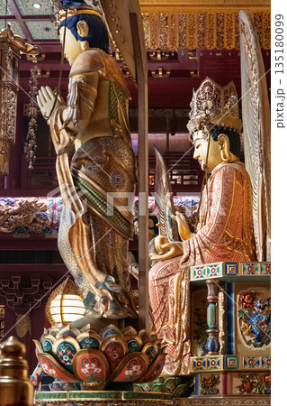 Buddha Tooth Relic Temple in Chinatown Singapore showcasing intricate statues and vibrant interiors Buddha Tooth Relic Temple in Chinatown Singapore showcasing intricate statues and vibrant interiors 135180099