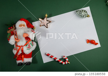 Ded Moroz Figure and Christmas Ornaments on Empty Paper Sheet Ded Moroz Figure and Christmas Ornaments on Empty Paper Sheet 135180550